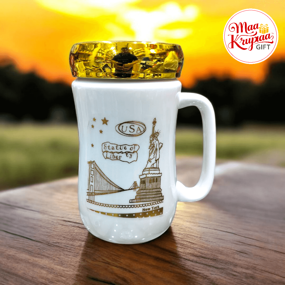 WHITE COLOUR CERAMIC MUG WITH GOLDEN COLOUR CAP ON IT 141