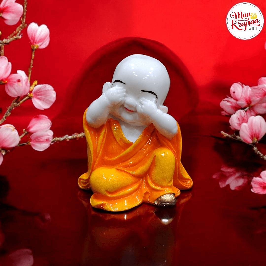 BABY BUDDHA MONK ORANGE DECORATIVE SHOWPIECE WITH PREMIUM FINISHING 1309