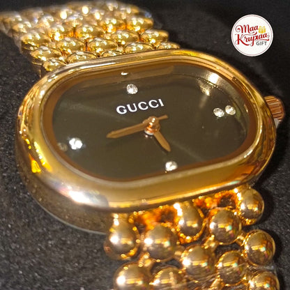 UNIQUE SHAPE BLACK COLOUR  DIAL WITH GOLD COLOUR CHAIN GUCCI LADIES WATCH 687