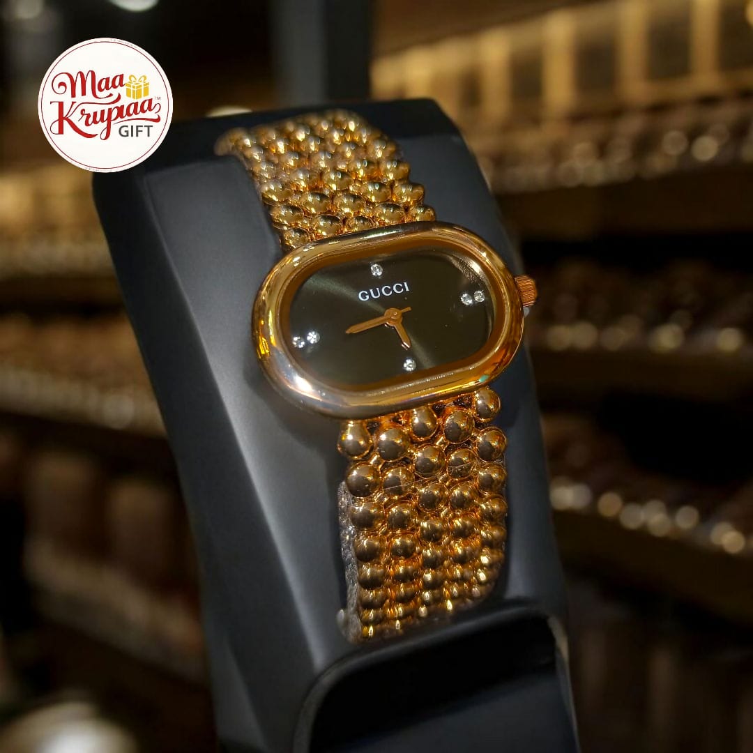 UNIQUE SHAPE BLACK COLOUR  DIAL WITH GOLD COLOUR CHAIN GUCCI LADIES WATCH 687