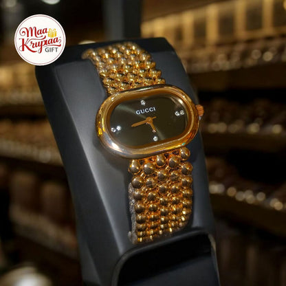 UNIQUE SHAPE BLACK COLOUR  DIAL WITH GOLD COLOUR CHAIN GUCCI LADIES WATCH 687