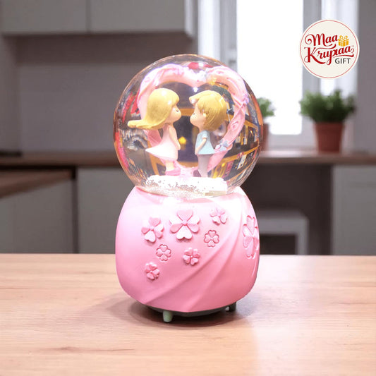 COUPLE KIDS HEART SNOW GLOBE – PINK FLOWER BASE LV1450 L15