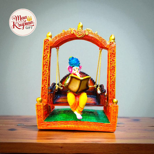 GANESHA ON SWING WITH BOOK – DECORATIVE IDOL W102