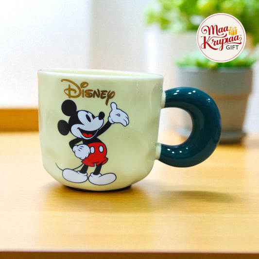MICKEY MOUSE CREAM & GREEN HANDLE MUG W21
