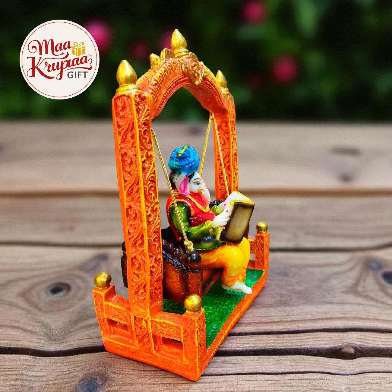 GANESHA ON SWING WITH BOOK – DECORATIVE IDOL W102